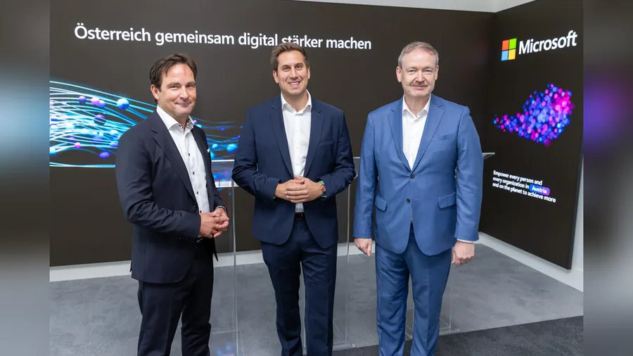 Alexander Pröll, Christian Helmenstein und Hermann Erlach bei der Präsentation der Economica-Studie zu Künstlicher Intelligenz in Österreich, im Hintergrund das Microsoft-Logo